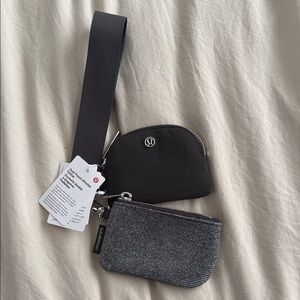 lululemon athletica black and heathered gray multi-pouch wristlet